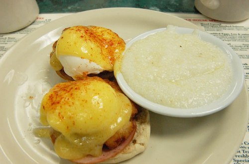Crabcakes Benedict with buttered grits.